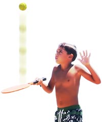 A child playing with a paddle and ball